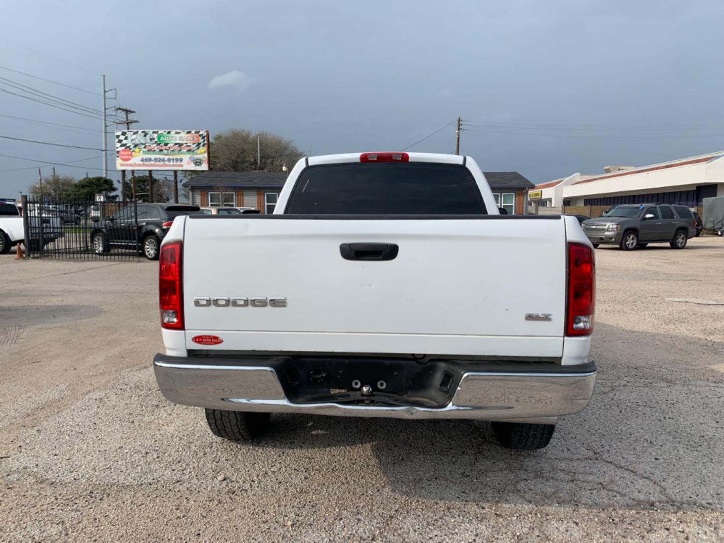 2004 White /Black Dodge Ram 1500 Laramie 2WD (1D7HA16N44J) with an 4.7L V8 SOHC 16V engine, Automatic transmission, located at 1830 North Belt Line Road, Irving, TX, 75061, (469) 524-0199, 32.834373, -96.993584 - Photo#2